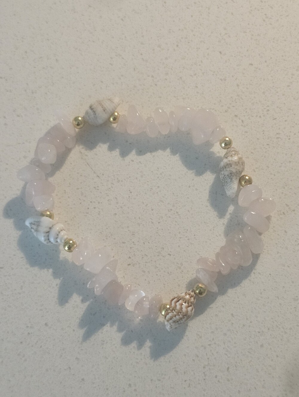 Rose Quartz Chip Stretch Bracelet with Gold Bead Accents